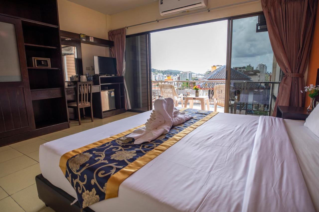 Lily Holiday 百合假日 Patong Extérieur photo